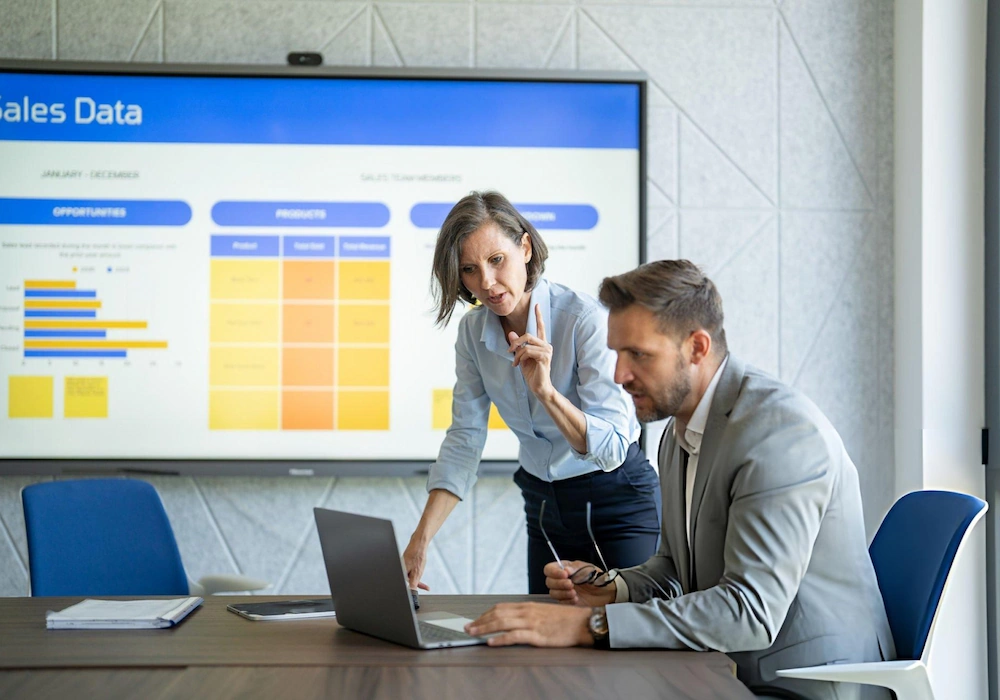 Consultants reviewing energy-market analysis
